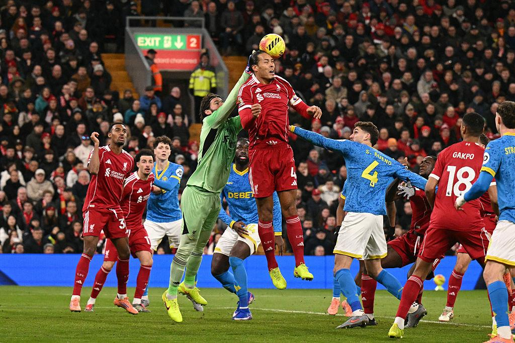 Liverpool defenders organise their defensive line