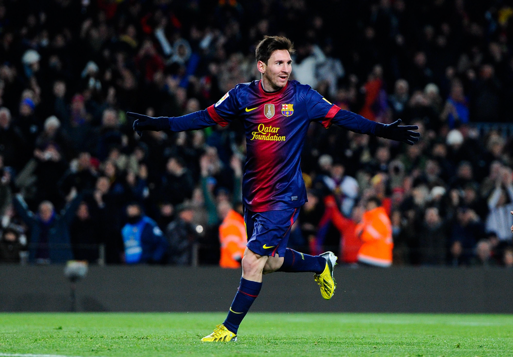 Lionel Messi celebrates a goal for Barcelona during his historic 91-goal calendar year in 2012.